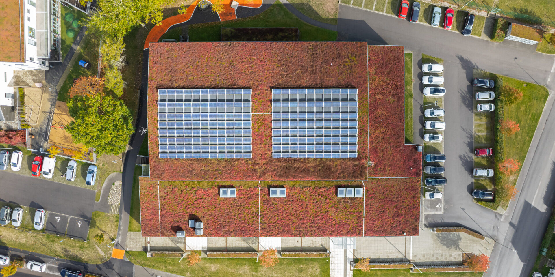 Aerial View On A Solar Battery Panel On A Roof Of A Building. Ecological, Green Roof.